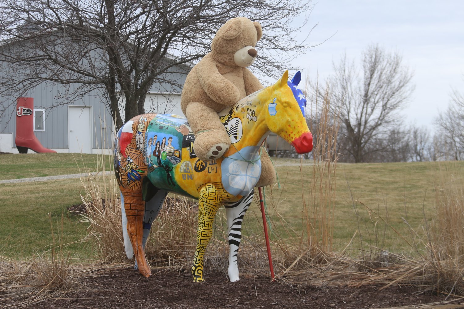 A giant teddy bear was seen atop a horse at Mid-Prairie Superintendent Mark Schneider’s home north of Wellman